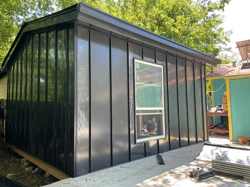 Black standing seam metal wall panels for Metal Roof Installation in St. Charles