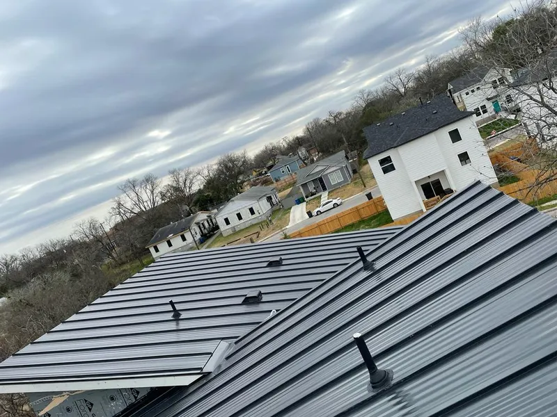 Standing seam metal roof panels with vents for Skylight Repair in St. Charles